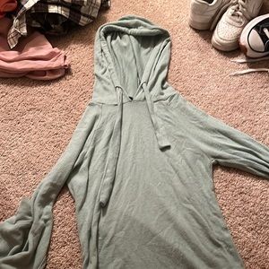 a light green sweatshirt with hoodie
